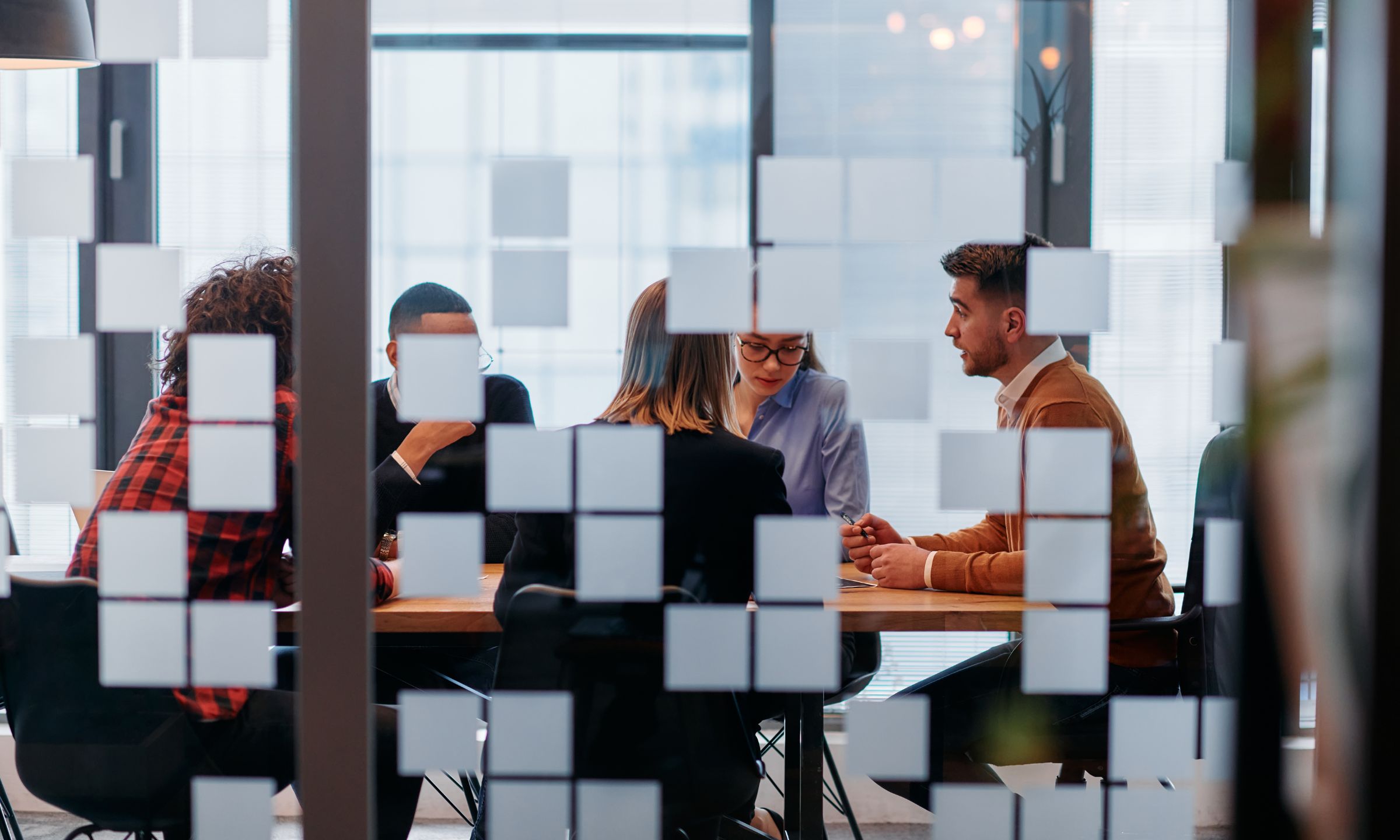 people discussing in a meeting room